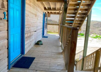 Entrance to room with blue door