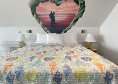 Room 5 - bed with seashells on bedspread