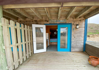 Entrance to room 7 - glass doors with blue frames