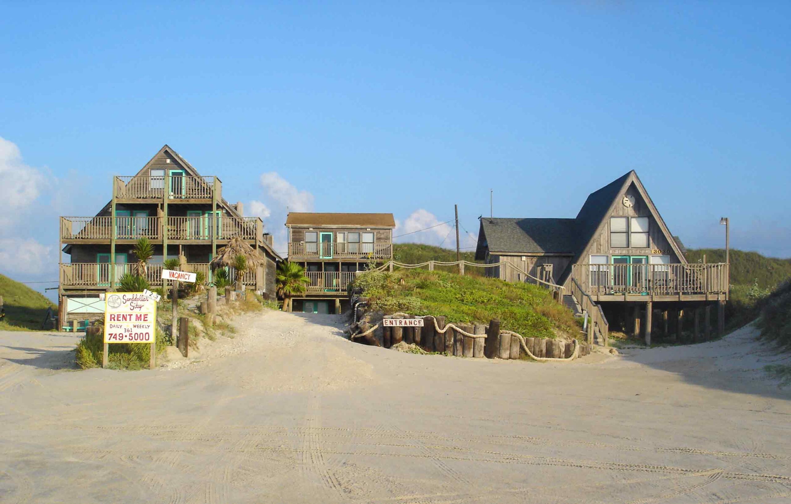 Three Sandollar Sity houses on the beach