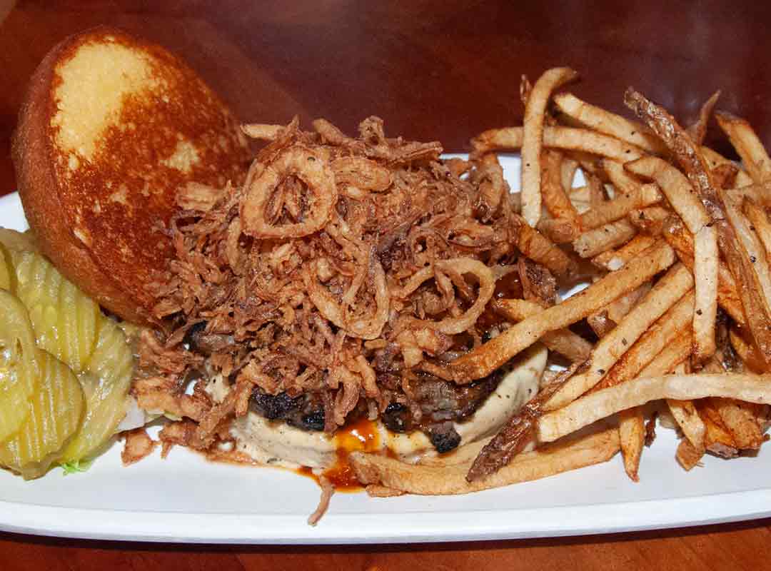 Jack & Coke burger - covered in onion rings