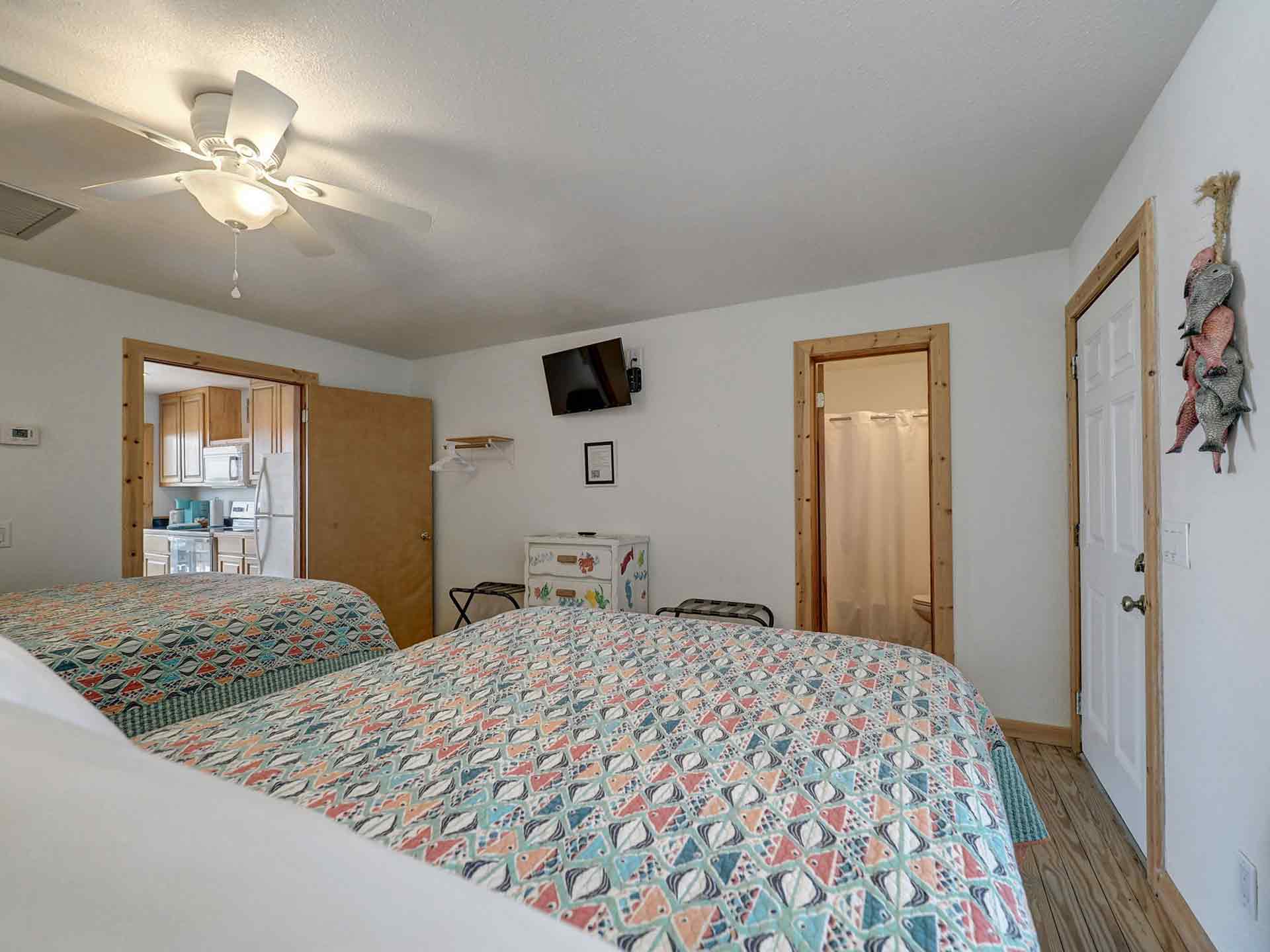 Bedroom in Unit 1 has 2 full beds.