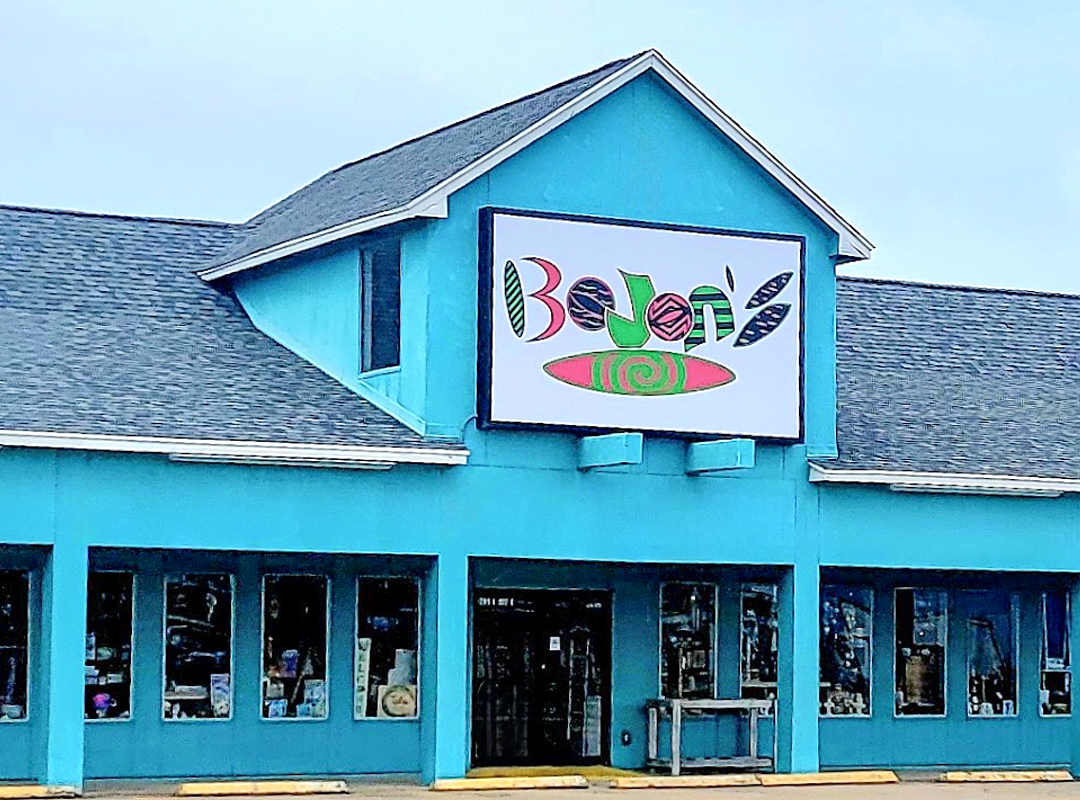 Turquoise blue building with BoJon's sign