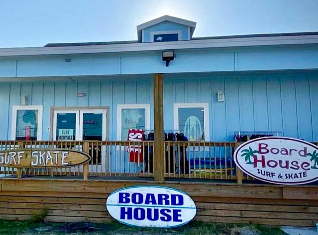 Turquoise blue building with BoJon's sign